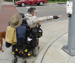 Handicap person reaching singal button